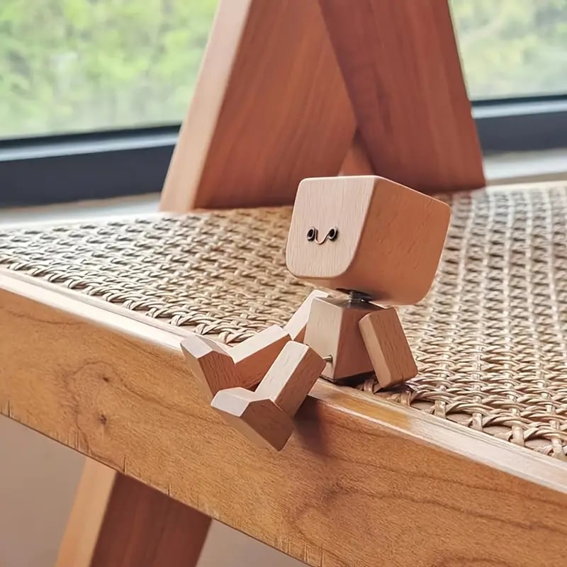 Motion activated wobble wooden figure