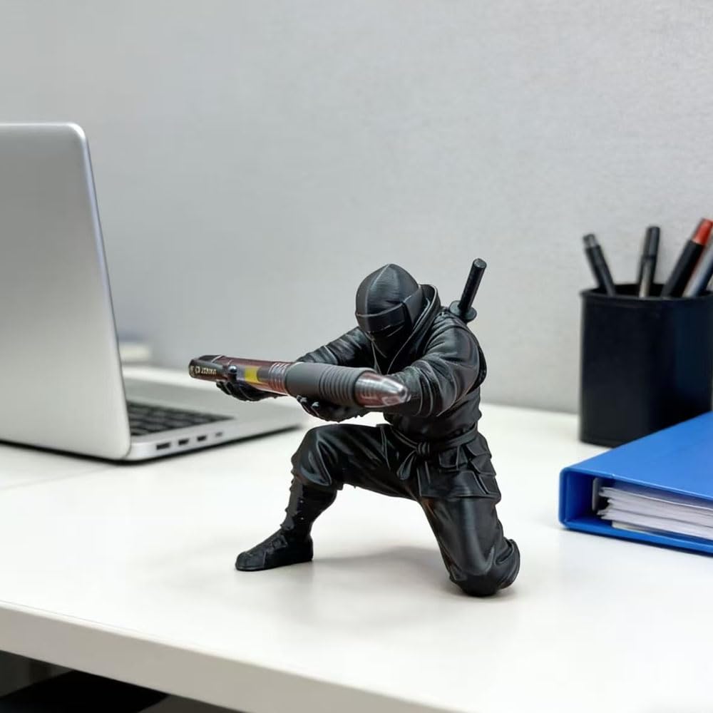 Ninja pen stand sitting next to a laptop on a clean white desk