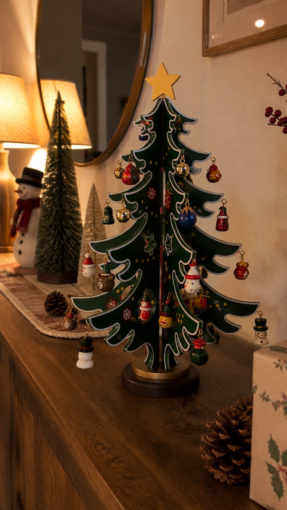 Vertical customer-style photo of the decorated wooden Christmas tree displayed on a sideboard