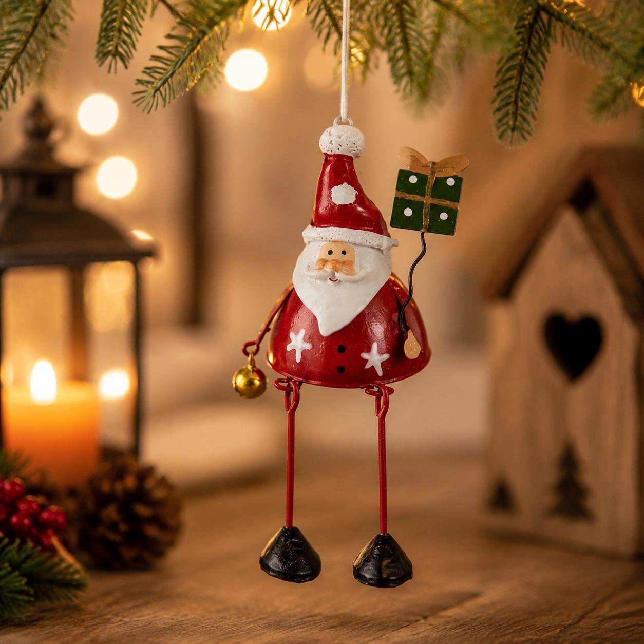 Close up of hand-painted iron Santa Christmas ornament