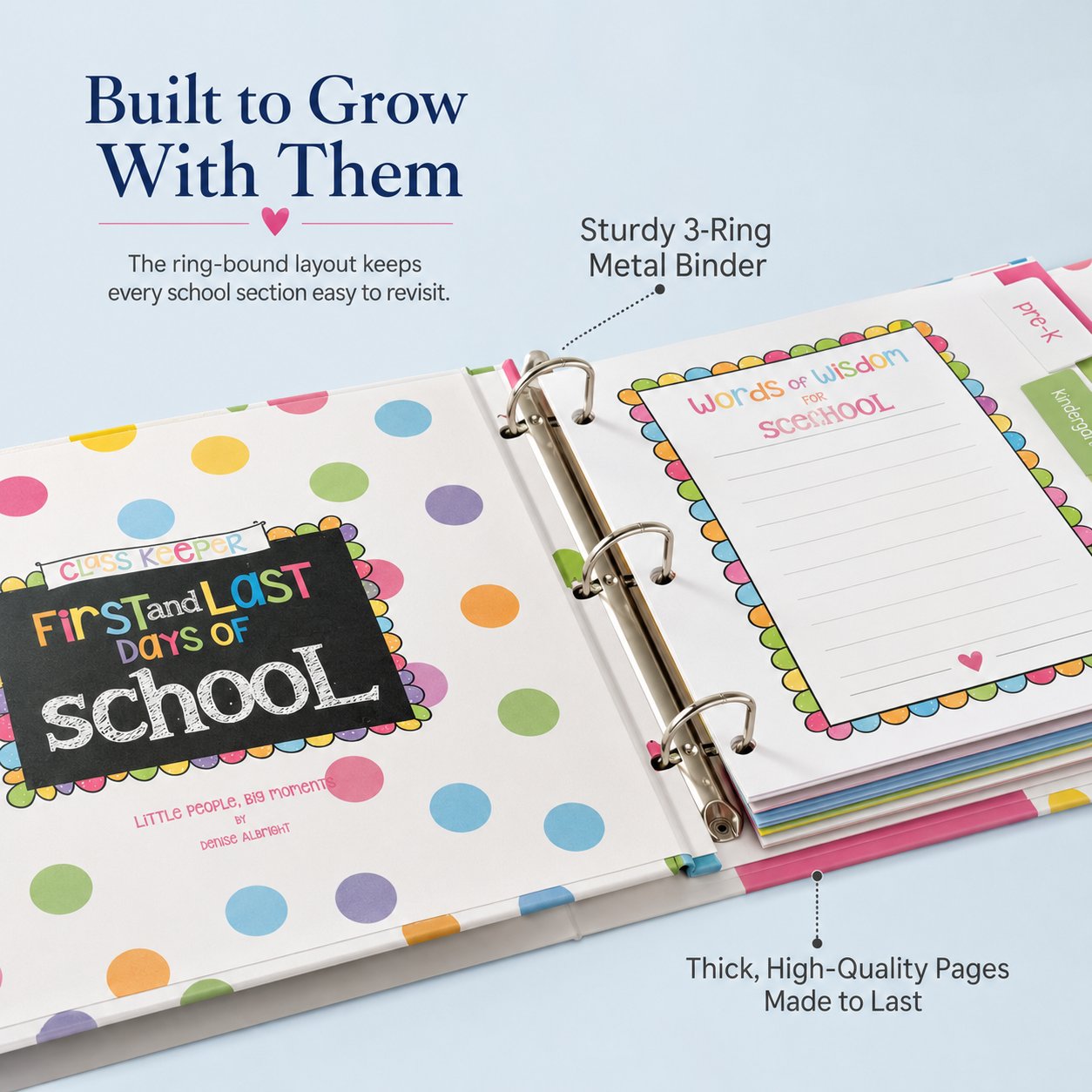Close-up of the school memory binder showing its three-ring metal mechanism and colorful tabbed pages