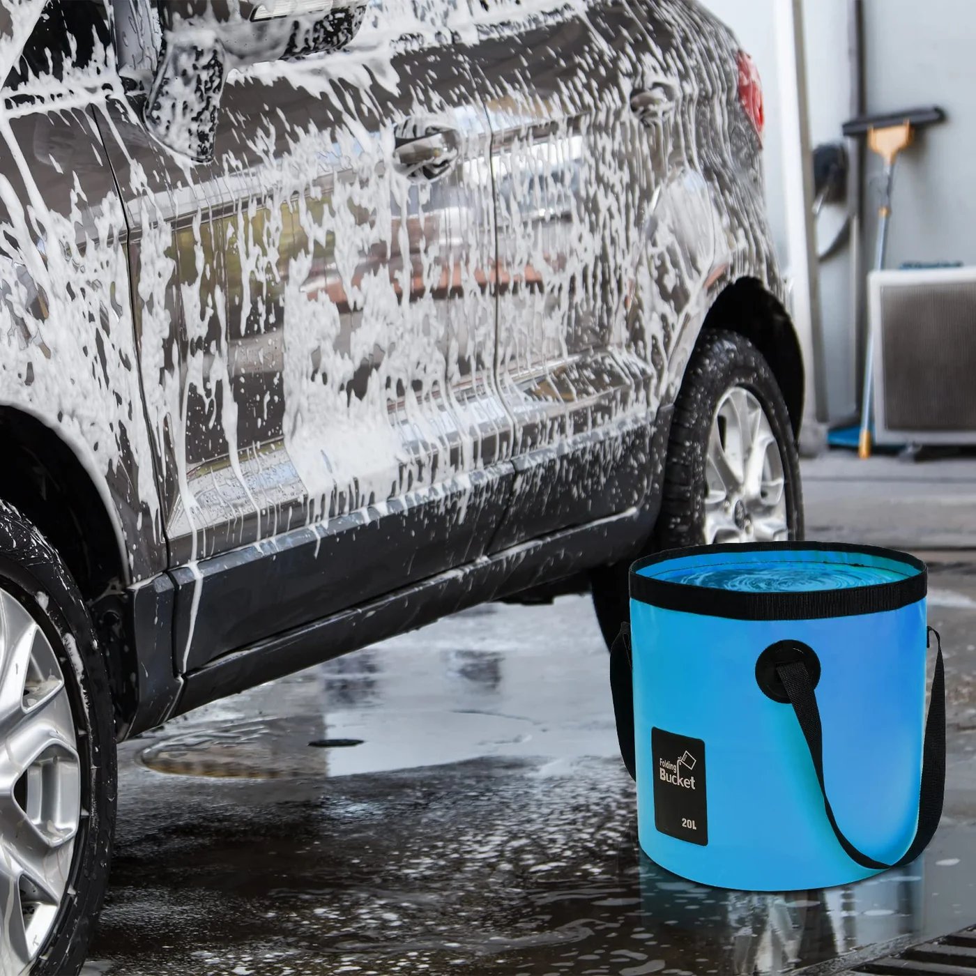 Blue foldable bucket used for washing a car Blue foldable bucket used for washing a car