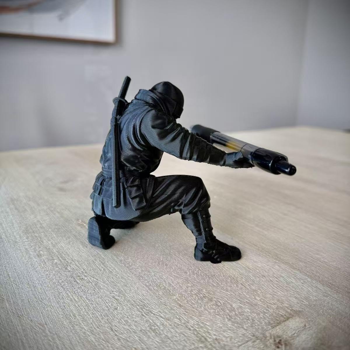 Back view details of the 3D printed ninja showing the katana sword